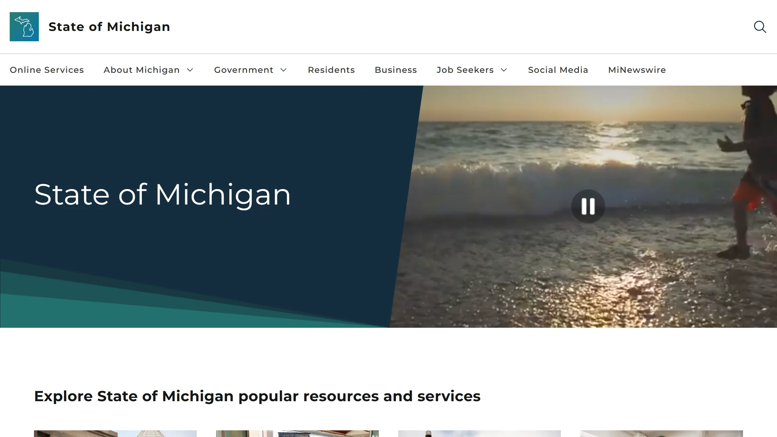 Michigan.gov homepage: the State of Michigan header and navigation above a video banner of a child running along a Great Lakes shoreline.